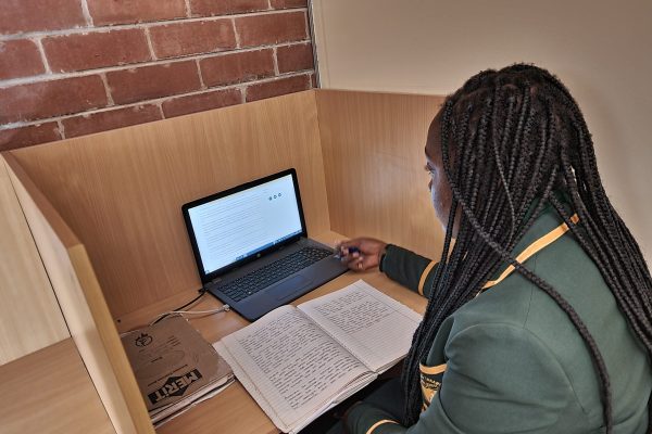 A student doing CALA research at Mvuma Community Information Centre