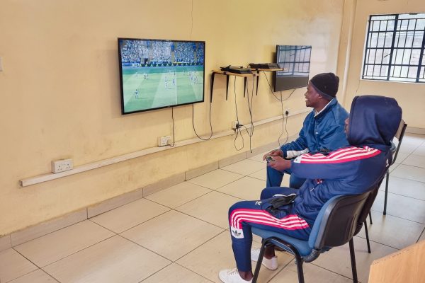 Playing video games at Chikato Community Information Centre