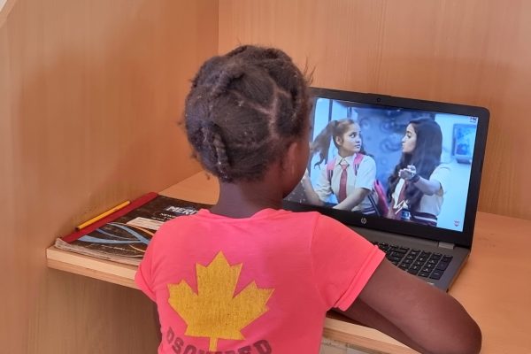 Watching movies after school at Jotsholo Community Information Centre